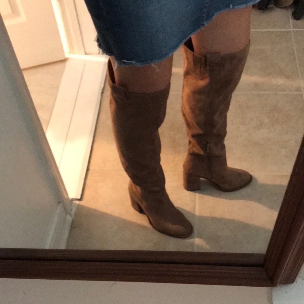 Cute suede boots go just over the knee. Heel is about3.5 inches tall.